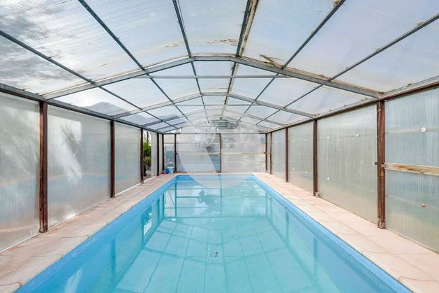 Foto 1 de Casa en venta en Roc Blanc de 5 habitaciones con terraza y piscina