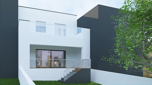 Foto 2 de Casa adossada en venda a Residencial de 3 habitacions amb terrassa i garatge
