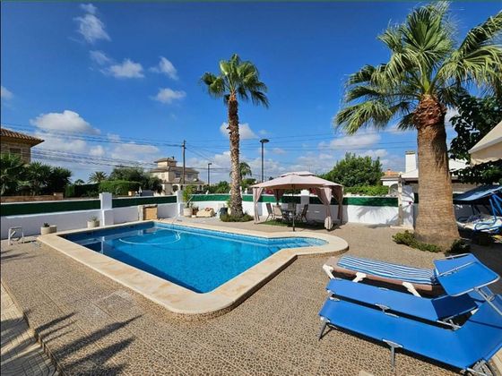 Foto 1 de Xalet en venda a calle Girasoles San Vicente de 5 habitacions amb terrassa i piscina