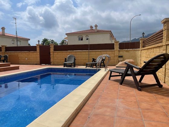 Foto 2 de Casa adossada en lloguer a urbanización Casalot de 2 habitacions amb terrassa i piscina