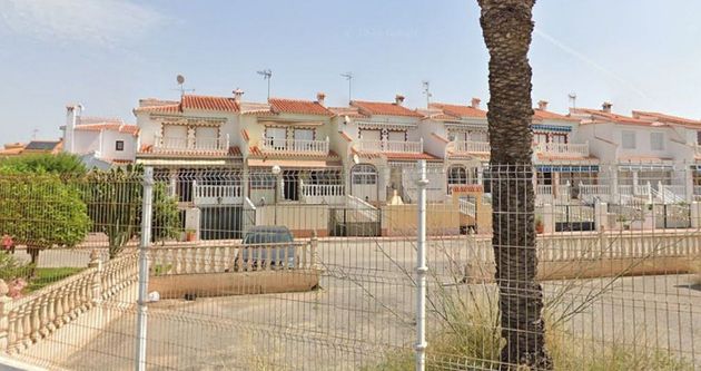 Foto 2 de Casa adossada en venda a urbanización Urbanización Torre Almedros II de 3 habitacions amb terrassa i piscina