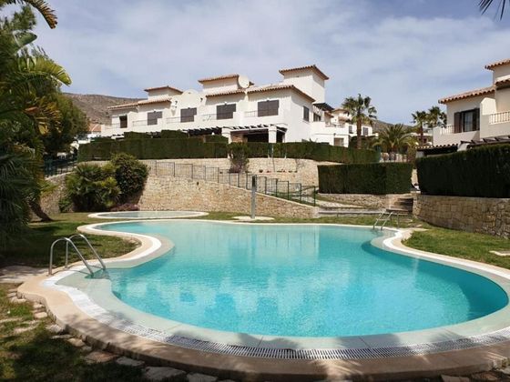 Foto 1 de Casa adosada en venta en Cala de Finestrat de 1 habitación con terraza y piscina