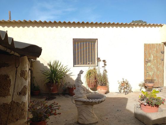 Foto 2 de Venta de casa adosada en Charco del Pino de 7 habitaciones con terraza y garaje