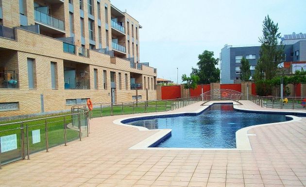 Foto 1 de Venta de piso en calle Del Puig Rom de 2 habitaciones con terraza y piscina