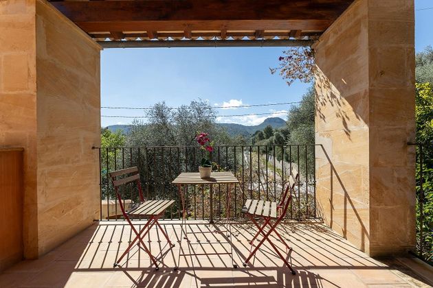 Foto 1 de Xalet en venda a Puigpunyent de 5 habitacions amb terrassa i jardí