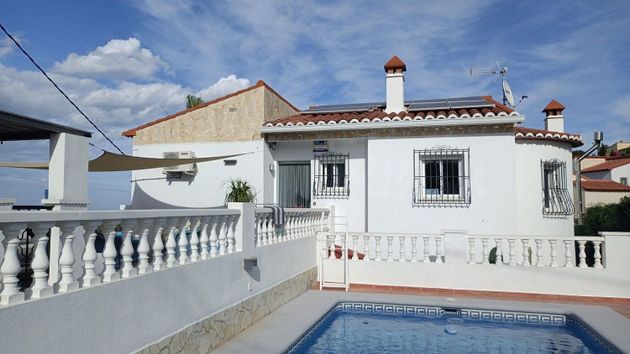 Foto 1 de Venta de chalet en Font d´En Carròs (la) de 3 habitaciones con terraza y piscina