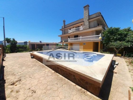 Foto 1 de Venta de chalet en avenida Alzira de 9 habitaciones con terraza y piscina