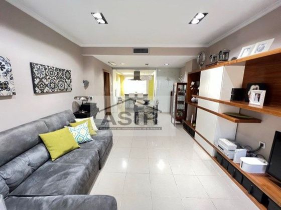 Foto 1 de Casa adossada en venda a calle Comarques Valencianes de 4 habitacions amb terrassa i garatge