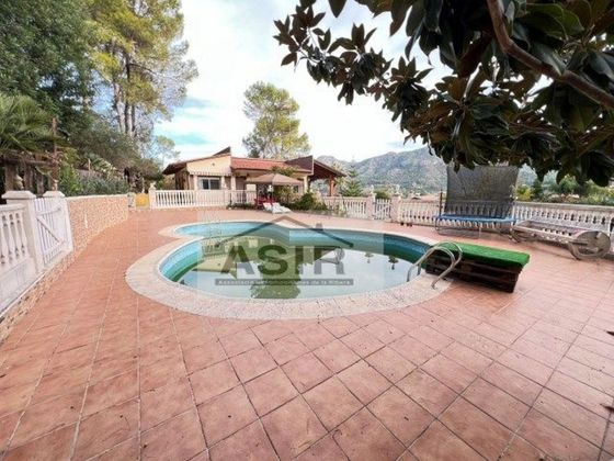 Foto 1 de Xalet en venda a urbanización Santa Marina de 5 habitacions amb terrassa i piscina