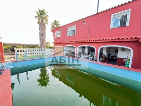 Foto 1 de Venta de chalet en calle Partida Barranquet de 4 habitaciones con terraza y piscina