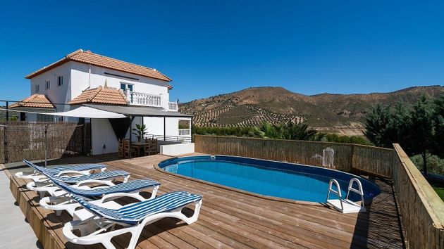 Foto 1 de Venta de casa rural en Iznájar de 6 habitaciones con terraza y piscina
