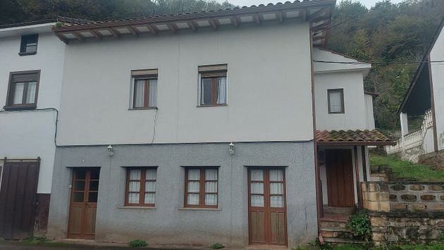 Foto 1 de Casa adossada en venda a calle Laneo de 2 habitacions amb terrassa i jardí