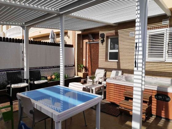Foto 1 de Casa adosada en venta en San Antonio de Benagéber de 5 habitaciones con terraza y piscina
