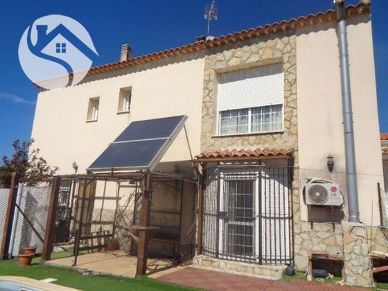 Foto 1 de Casa adosada en venta en San Antón de 5 habitaciones con piscina y garaje