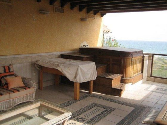 Foto 1 de Casa adossada en venda a Elviria de 5 habitacions amb terrassa i piscina