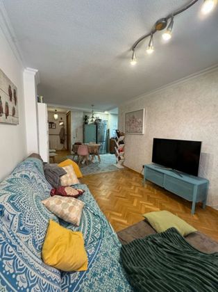 Foto 2 de Venta de piso en San Fermín de 4 habitaciones con terraza y piscina