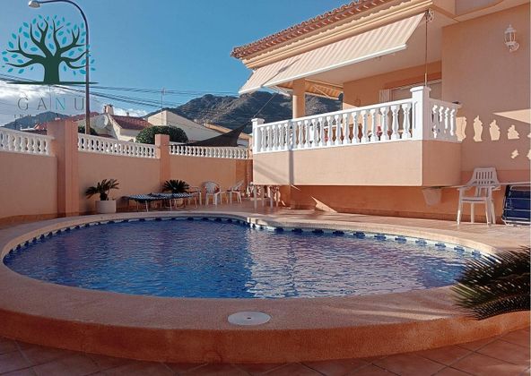 Foto 1 de Casa en venta en calle Cala Abierta de 5 habitaciones con terraza y piscina