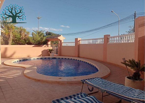 Foto 2 de Casa en venta en calle Cala Abierta de 5 habitaciones con terraza y piscina
