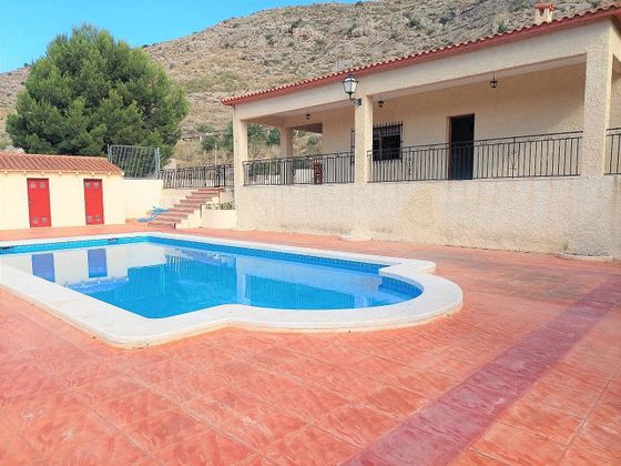 Foto 2 de Chalet en venta en El Fondo de les Neus-El Hondon de las Nieves de 4 habitaciones con terraza y piscina