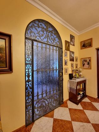 Foto 1 de Casa adossada en venda a Moguer de 4 habitacions amb jardí i aire acondicionat