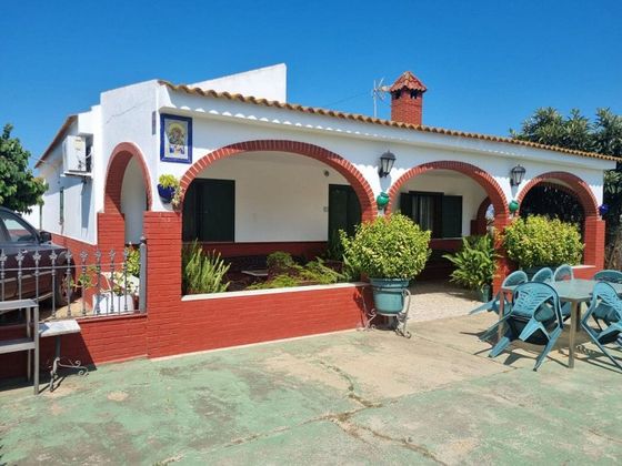 Foto 1 de Casa en venta en San Juan del Puerto de 3 habitaciones con terraza y piscina