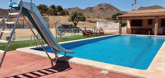 Foto 1 de Casa rural en venda a Águilas ciudad de 4 habitacions amb terrassa i piscina