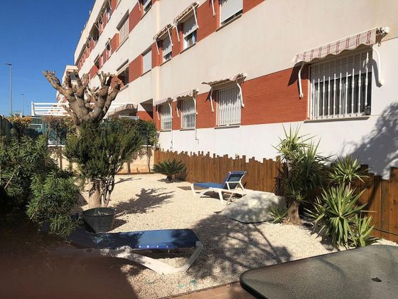 Foto 1 de Piso en venta en Águilas ciudad de 4 habitaciones con terraza y piscina