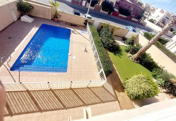 Foto 1 de Piso en venta en Playa de los Locos de 3 habitaciones con terraza y piscina