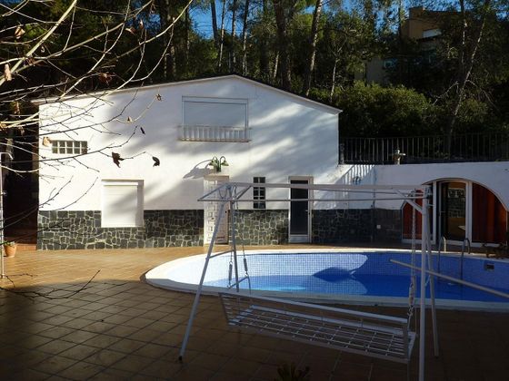 Foto 1 de Chalet en venta en Les Fonts de 8 habitaciones con piscina y garaje