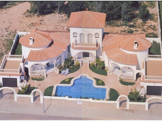 Foto 1 de Casa en venda a Miami Platja - Miami Playa de 6 habitacions amb terrassa i piscina