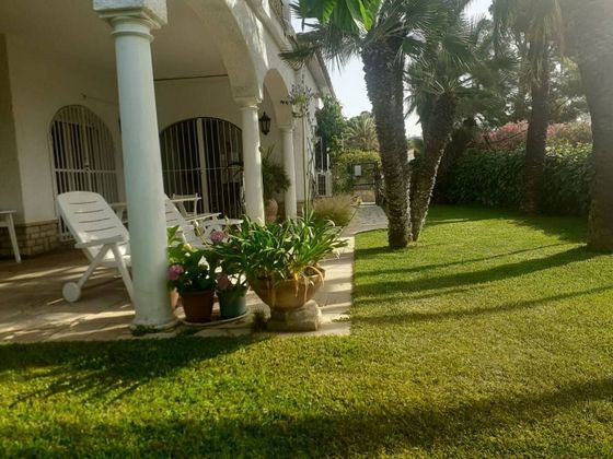 Foto 2 de Casa en venta en Miami Platja - Miami Playa de 4 habitaciones con piscina y jardín