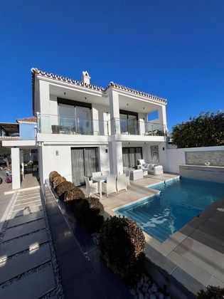 Foto 1 de Chalet en venta en Nueva Alcántara de 3 habitaciones con terraza y piscina