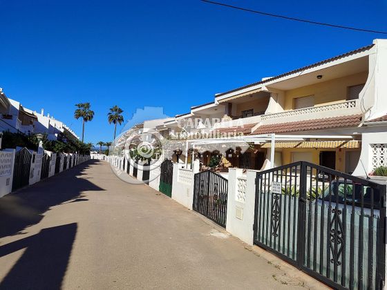 Foto 1 de Casa adossada en venda a Playa norte de 2 habitacions amb terrassa i piscina