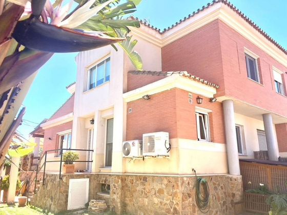 Foto 1 de Venta de casa en Churriana de 4 habitaciones con terraza y piscina