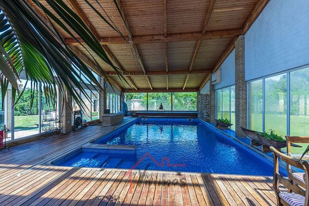 Foto 1 de Chalet en venta en Aljaraque de 5 habitaciones con terraza y piscina