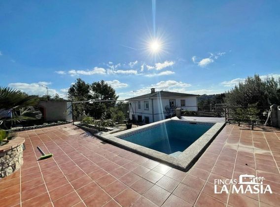 Foto 1 de Casa adossada en venda a Mas Milà de 4 habitacions amb terrassa i piscina