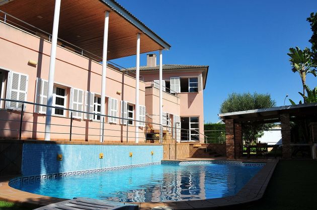 Foto 1 de Venta de chalet en calle Alfabia de 5 habitaciones con terraza y piscina