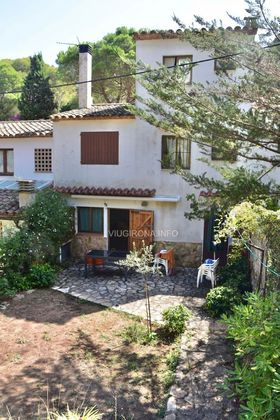 Foto 1 de Casa adossada en venda a Sa Riera - Sa Fontansa de 4 habitacions amb terrassa i jardí