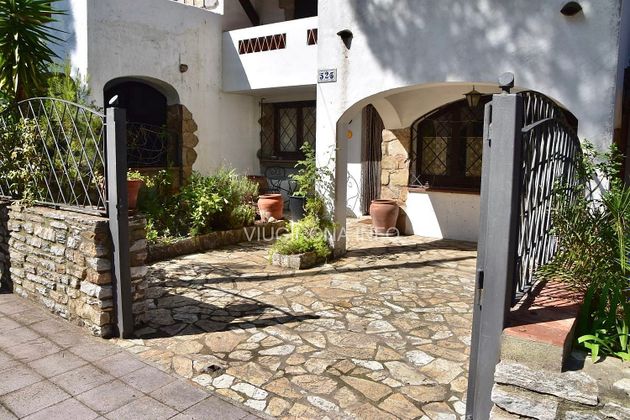Foto 2 de Casa adosada en venta en Sa Riera - Sa Fontansa de 4 habitaciones con terraza y jardín