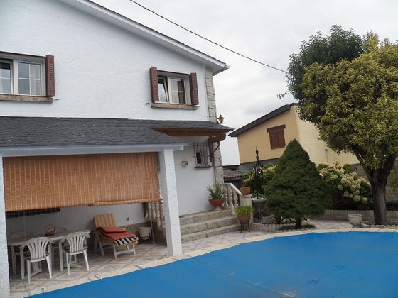 Foto 1 de Casa en venta en Miraflores de la Sierra de 3 habitaciones con piscina y calefacción