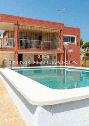 Foto 1 de Casa en venda a El Grao de 4 habitacions amb terrassa i piscina