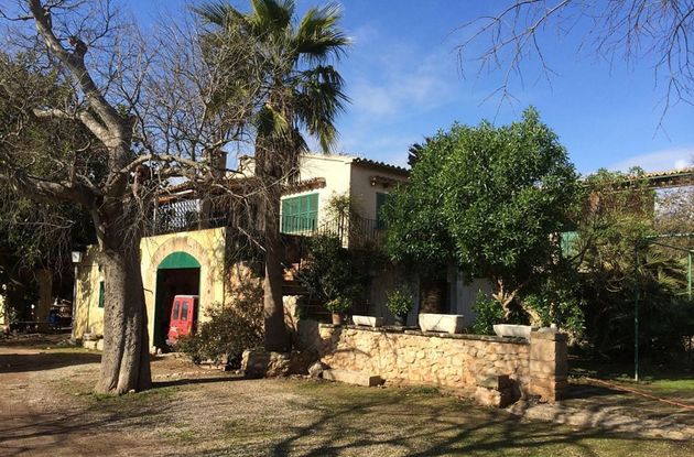 Foto 1 de Casa rural en venta en calle Diseminado Son Sardina de 5 habitaciones con jardín