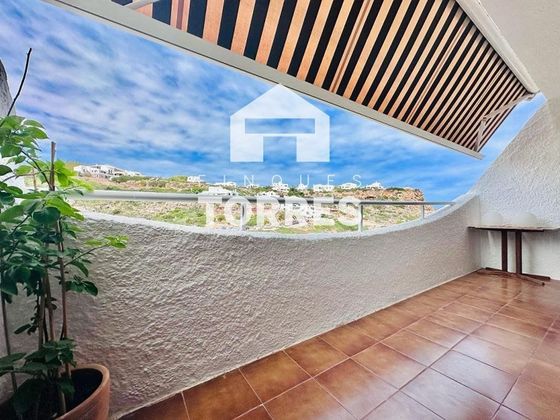 Foto 1 de Piso en venta en Cala Morell de 2 habitaciones con terraza y piscina