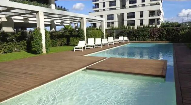 Foto 1 de Piso en venta en Marina Botafoc - Platja de Talamanca de 2 habitaciones con terraza y piscina