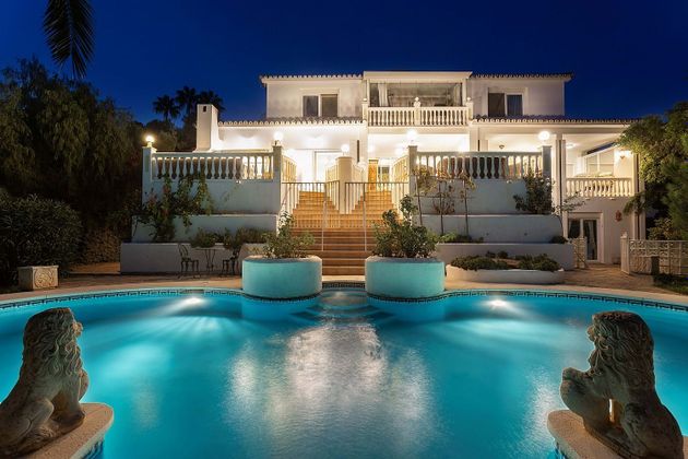 Foto 1 de Xalet en venda a Riviera del Sol de 9 habitacions amb terrassa i piscina