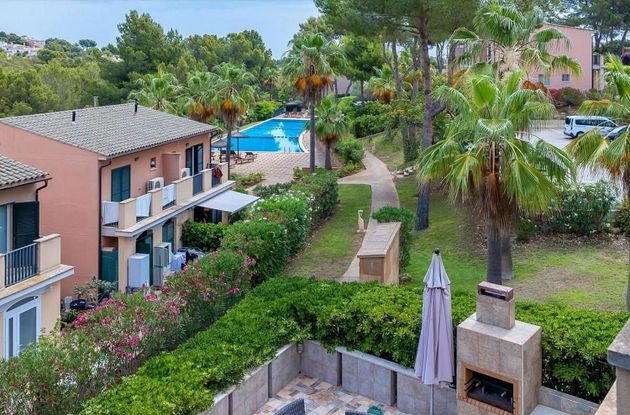 Foto 1 de Casa adossada en venda a Cala Vinyes de 3 habitacions amb terrassa i piscina