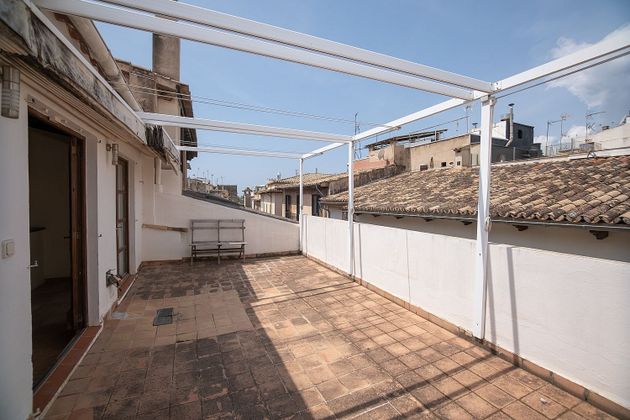 Foto 1 de Casa adosada en venta en La Llotja - Sant Jaume de 7 habitaciones con terraza y balcón