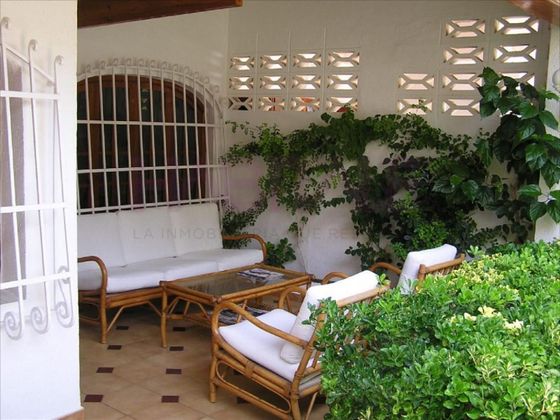 Foto 1 de Xalet en venda a El Perelló - Les Palmeres - Mareny de Barraquetes de 4 habitacions amb terrassa i piscina