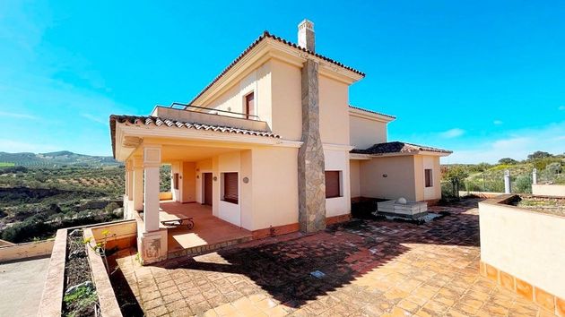 Foto 1 de Xalet en venda a urbanización Arrabal Antequera Golf de 8 habitacions amb terrassa i piscina