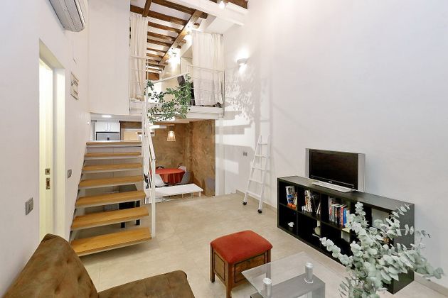 Foto 1 de Dúplex en venda a Vila de Gràcia de 2 habitacions amb terrassa i aire acondicionat